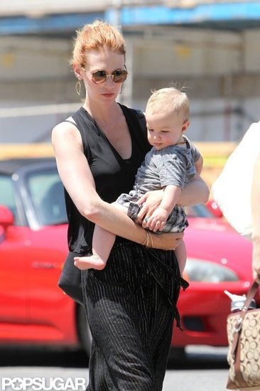 January Jones wore sunglasses and her hair pulled back in LA. January Jones wore sunglasses and her hair pulled back in LA.