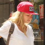 Jessica Hart's Off-Duty Style: Denim Cutoffs and High-Top Converse Jessica Hart's Off-Duty Style: Denim Cutoffs and High-Top Converse