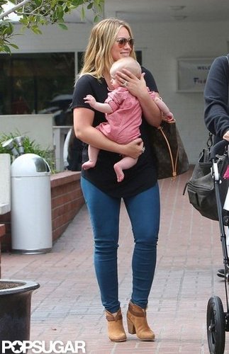 Hilary Duff was all smiles as she carried baby Luca Comrie.
Hilary Duff was all smiles as she carried baby Luca Comrie.