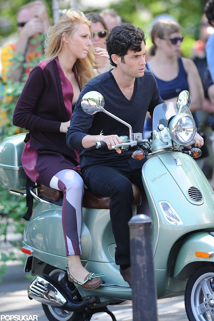 Blake Lively and Penn Badgley hopped on a Vespa in NYC. Blake Lively and Penn Badgley hopped on a Vespa in NYC.