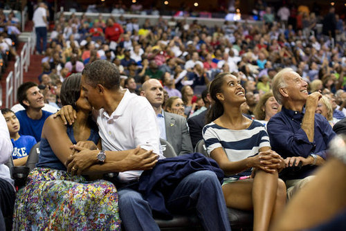 Barack and Michelle went for it after getting caught on the Kiss Cam at a basketball game in Washington DC.
Barack and Michelle went for it after getting caught on the Kiss Cam at a basketball game in Washington DC.