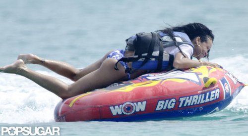 Rihanna held on tight while having some fun in the water on a trip to Barbados in July.
Rihanna held on tight while having some fun in the water on a trip to Barbados in July.