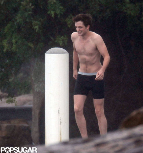 Robert Pattinson took off his shirt to jump in the water in Rio de Janeiro in December 2010.
Robert Pattinson took off his shirt to jump in the water in Rio de Janeiro in December 2010.