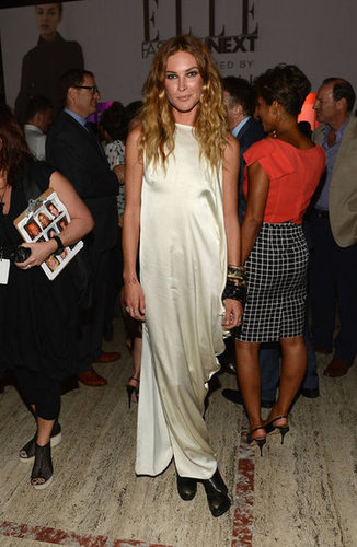 Erin Wasson paired black ankle boots with a silky floor-length dress at the Elle Fashion Next show.
Erin Wasson paired black ankle boots with a silky floor-length dress at the Elle Fashion Next show.
