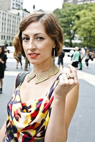 A curly, '20s-esque bob was brought to greater heights with a cat-eye liner, orange lipstick, and gold nail polish.
Photo by Caroline Voagen Nelson
A curly, '20s-esque bob was brought to greater heights with a cat-eye liner, orange lipstick, and gold nail polish.
Photo by Caroline Voagen Nelson