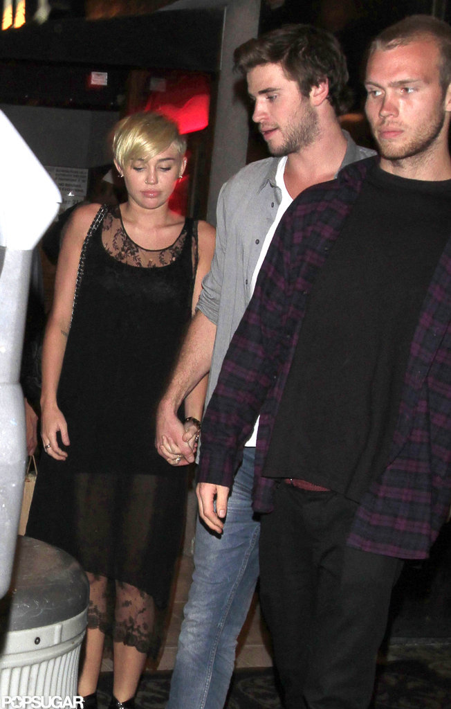 Liam Heads to His Hunger Games Set Following a Night Out With Miley Liam Heads to His Hunger Games Set Following a Night Out With Miley