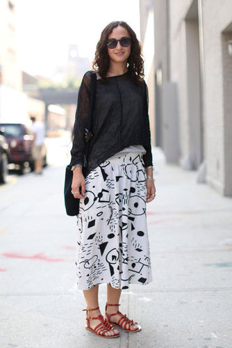 This printed skirt got an understated finish via a slouchy black top and flat sandals.
This printed skirt got an understated finish via a slouchy black top and flat sandals.