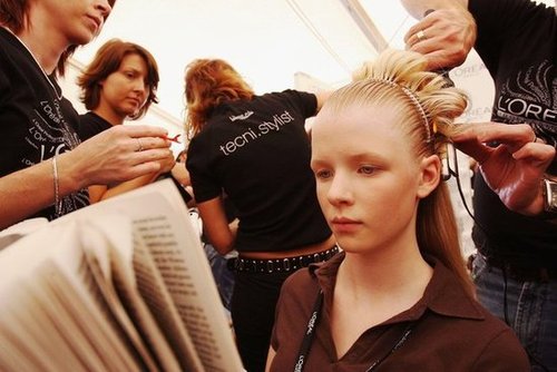 A model kept her eyes on her page-turner during Melbourne's Fashion Week in 2006.
A model kept her eyes on her page-turner during Melbourne's Fashion Week in 2006.