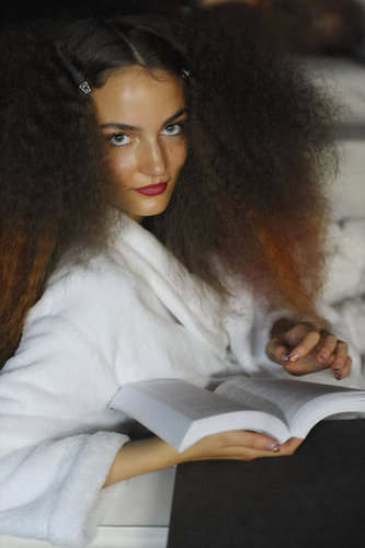 This model paired big hair with a book backstage before the Unique Spring/Summer 2011 show during London Fashion Week in 2010.
This model paired big hair with a book backstage before the Unique Spring/Summer 2011 show during London Fashion Week in 2010.
