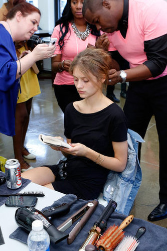 This model read a book while being primped for the Carmen Marc Valvo Spring 2013 show at Mercedes-Benz Fashion Week.
This model read a book while being primped for the Carmen Marc Valvo Spring 2013 show at Mercedes-Benz Fashion Week.