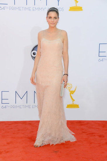 Actress Amanda Peet walked the Emmys red carpet in a stunning nude gown.
Actress Amanda Peet walked the Emmys red carpet in a stunning nude gown.