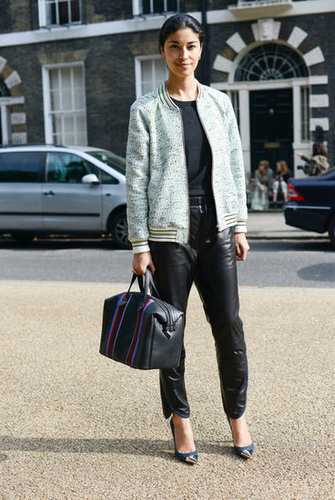 Proving even the sportiest of wares can take on a more formal role, Caroline Issa donned a tweedy varsity jacket with silky track pants and cap-toe pumps.
Proving even the sportiest of wares can take on a more formal role, Caroline Issa donned a tweedy varsity jacket with silky track pants and cap-toe pumps.