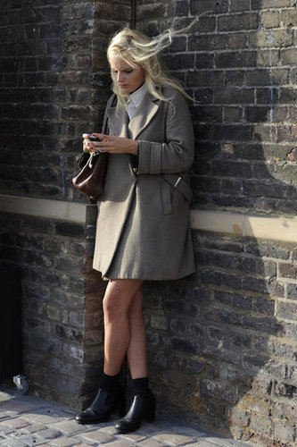 A polished trench-inspired coat can tie an entire outfit together.
A polished trench-inspired coat can tie an entire outfit together.