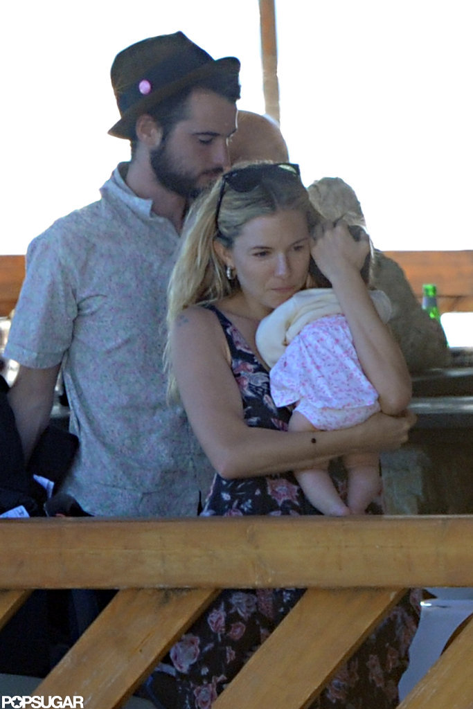 Sienna Miller held baby Marlowe tight with Tom Sturridge close by on their boat ride.
Sienna Miller held baby Marlowe tight with Tom Sturridge close by on their boat ride.