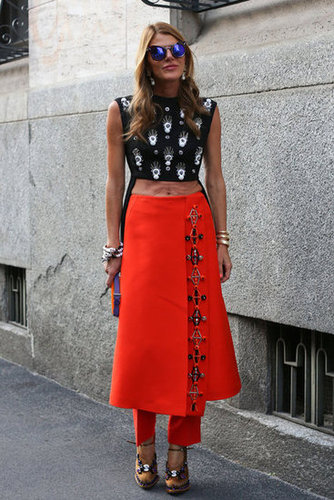 Anna Dello Russo bared her midriff and opted for quirky layers in this mix.
Anna Dello Russo bared her midriff and opted for quirky layers in this mix.