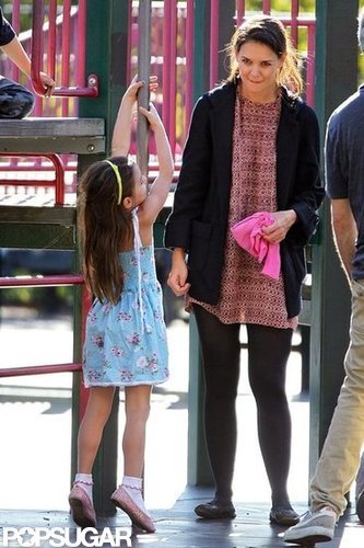 Katie Holmes watched over Suri while she played.
Katie Holmes watched over Suri while she played.