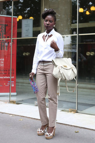 A riff on the classics via a white button-down with a cutout neckline and a pair of understated trousers.
A riff on the classics via a white button-down with a cutout neckline and a pair of understated trousers.