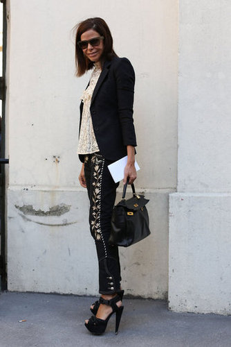 Embroidered trousers have a cool effect on a lace top and blazer.
Embroidered trousers have a cool effect on a lace top and blazer.