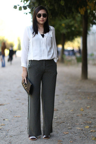 Just a pair of printed trousers upgrade a silky white button-down.
Just a pair of printed trousers upgrade a silky white button-down.