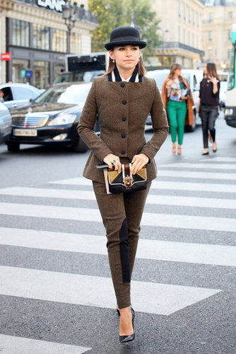 Miroslava Duma switched gears in a buttoned-up tweed suit and a bowler hat.
Miroslava Duma switched gears in a buttoned-up tweed suit and a bowler hat.