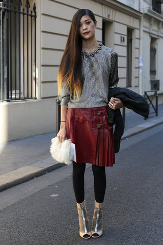 Statement pieces by the threes — this styler works a metallic top, burgundy skirt, open-toed booties, and a fur clutch with ease.
Statement pieces by the threes — this styler works a metallic top, burgundy skirt, open-toed booties, and a fur clutch with ease.