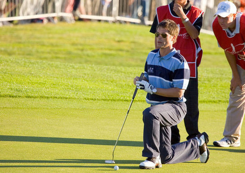 Rob Lowe had help with his shot at the August 2005 All Star Golf Cup in Newport, United Kingdom.
Rob Lowe had help with his shot at the August 2005 All Star Golf Cup in Newport, United Kingdom.