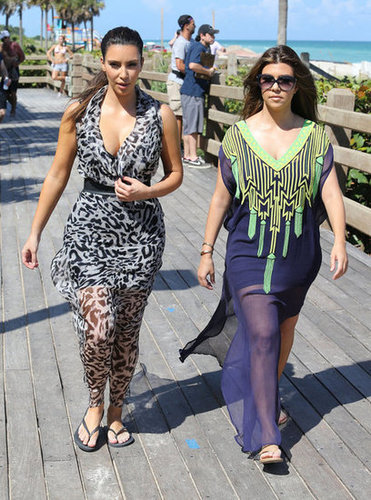 Kim and Kourtney Hit the Beach While Khloe Preps For The X Factor Kim and Kourtney Hit the Beach While Khloe Preps For The X Factor