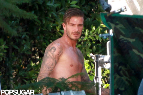 David Beckham was shirtless.
David Beckham was shirtless.