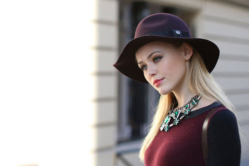 Emerald jewels contrasted the rich burgundy on her Fall fedora.
Emerald jewels contrasted the rich burgundy on her Fall fedora.