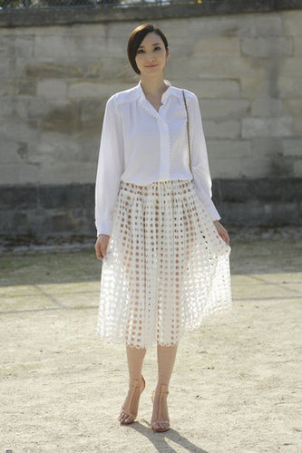 Already taking Spring's sheer skirt trend for a test drive, this styler tempered the look with a classic button-down.
Already taking Spring's sheer skirt trend for a test drive, this styler tempered the look with a classic button-down.