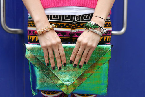 Metallic green was just the thing to rival tribal print and statement bracelets.
Metallic green was just the thing to rival tribal print and statement bracelets.