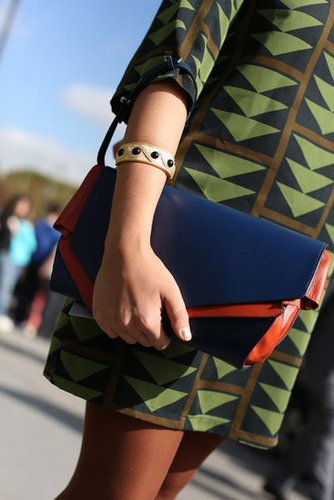 A sleek clutch was a cool counterpoint to bold print.
A sleek clutch was a cool counterpoint to bold print.
