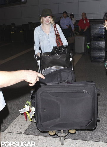 Emma Stone Packs Up Fashion Week Fun and Heads Home Emma Stone Packs Up Fashion Week Fun and Heads Home