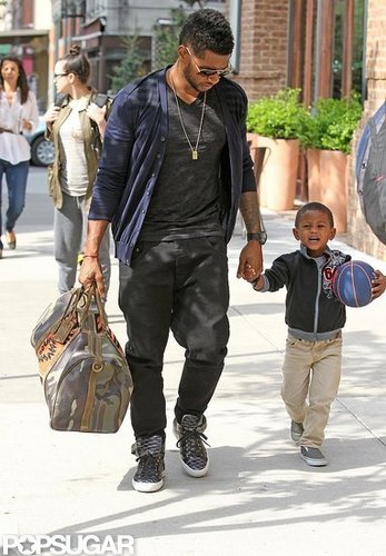 Little Naviyd clutched a blue basketball while he and Usher arrived at their New York City hotel in May 2011.
Little Naviyd clutched a blue basketball while he and Usher arrived at their New York City hotel in May 2011.