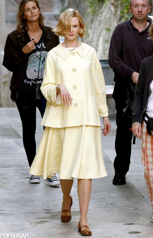 Nicole Kidman wore a yellow jacket and skirt to play Grace Kelly for her new film, Grace of Monaco.
Nicole Kidman wore a yellow jacket and skirt to play Grace Kelly for her new film, Grace of Monaco.