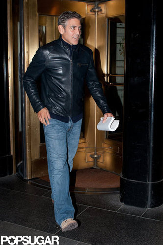 George Clooney left his hotel in Manhattan carrying a script.
George Clooney left his hotel in Manhattan carrying a script.