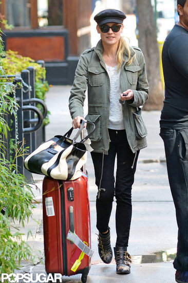 Diane Kruger wheeled her suitcase out of her NYC hotel.
Diane Kruger wheeled her suitcase out of her NYC hotel.