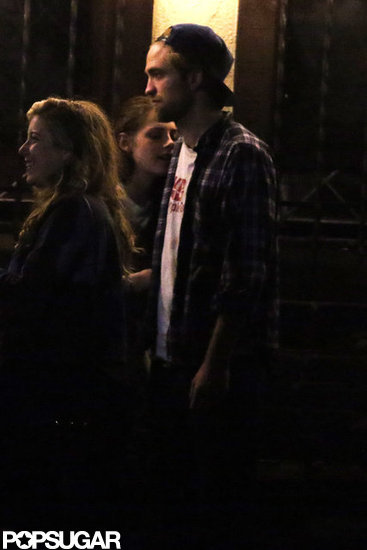 Kristen Stewart and Robert Pattinson hung out outside a bar.
Kristen Stewart and Robert Pattinson hung out outside a bar.