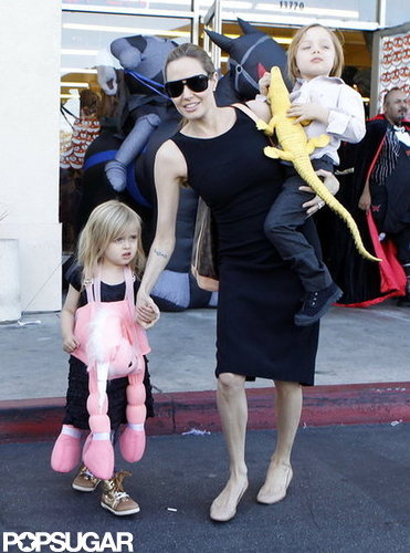Angelina Jolie carried Knox Jolie-Pitt on her hip as she made her way out of a Halloween store in LA with Vivienne Jolie-Pitt and Shiloh Jolie-Pitt in October 2012.
Angelina Jolie carried Knox Jolie-Pitt on her hip as she made her way out of a Halloween store in LA with Vivienne Jolie-Pitt and Shiloh Jolie-Pitt in October 2012.