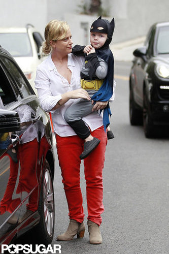 Amy Poehler carried her son, Archie Arnett, dressed as Batman to a costume birthday party in LA.
Amy Poehler carried her son, Archie Arnett, dressed as Batman to a costume birthday party in LA.