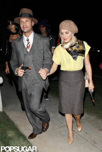 Ryan Seacrest and Julianne Hough went to an LA bash on Friday as Bonnie and Clyde.
Ryan Seacrest and Julianne Hough went to an LA bash on Friday as Bonnie and Clyde.