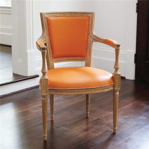 Bright tangerine upholstery gives the vintage-inspired design of the Global Views Marilyn Orange Leather Arm Chair ($1,073) a fresh, contemporary twist.
Bright tangerine upholstery gives the vintage-inspired design of the Global Views Marilyn Orange Leather Arm Chair ($1,073) a fresh, contemporary twist.