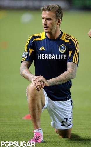David Beckham stretched before the game.
David Beckham stretched before the game.