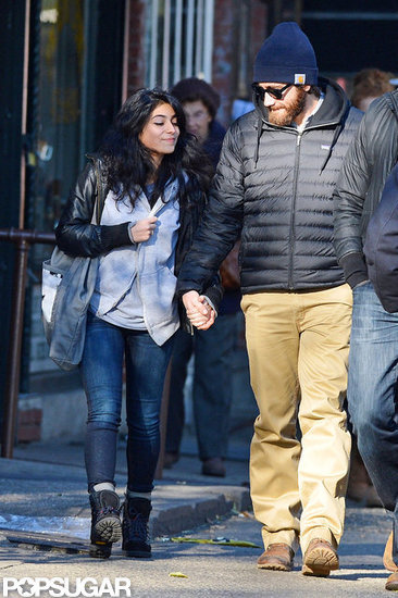 Jake Gyllenhaal held hands with a female friend during a stroll through NYC. Jake Gyllenhaal held hands with a female friend during a stroll through NYC.