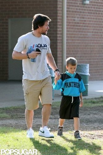 Mark Wahlberg held his son's hand at the park.
Mark Wahlberg held his son's hand at the park.