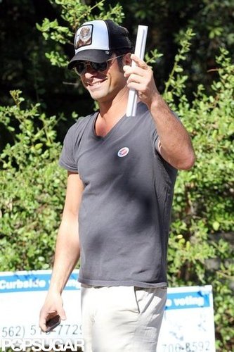 John Stamos wore his voting sticker out of his local poll in LA.
John Stamos wore his voting sticker out of his local poll in LA.