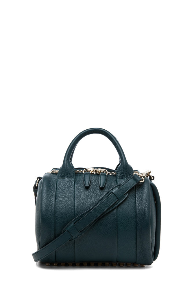 Another year, another beautiful bag to obsess over. This time around, I've got my eye on Alexander Wang's Rockie Satchel ($725). It's a smaller, more compact version of his infamous Rocco duffel, but it definitely doesn't skimp on style. The deep teal shade and brass hardware make it especially drool-worthy.
— Britt Stephens, assistant editor
Another year, another beautiful bag to obsess over. This time around, I've got my eye on Alexander Wang's Rockie Satchel ($725). It's a smaller, more compact version of his infamous Rocco duffel, but it definitely doesn't skimp on style. The deep teal shade and brass hardware make it especially drool-worthy.
— Britt Stephens, assistant editor