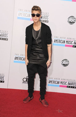 Justin Bieber wore red studded loafers.
Justin Bieber wore red studded loafers.