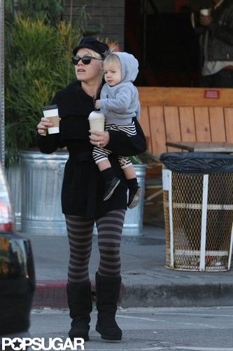 Pink balanced two coffees and Willow Hart as she crossed the street.
Pink balanced two coffees and Willow Hart as she crossed the street.