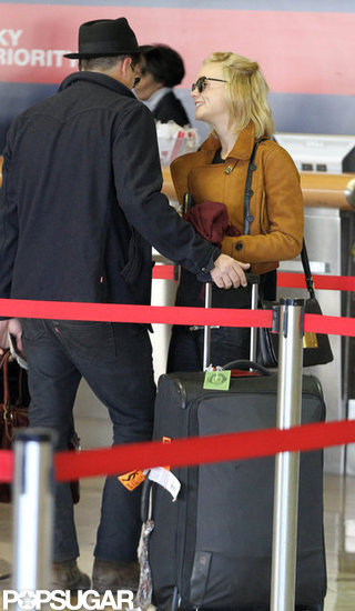 Carey Mulligan and Marcus Mumford waited in LA at LAX. Carey Mulligan and Marcus Mumford waited in LA at LAX.